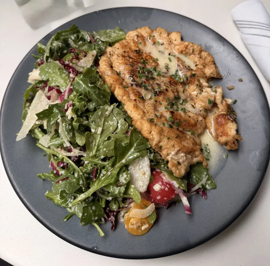 Chicken paillard with arugula salad